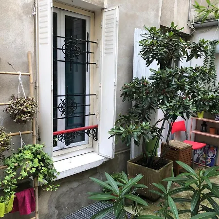 Maryline: Cozy Parisian Retreat With Patio View Paris